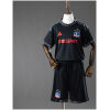 Front view of the Kids Colo Colo Away Kit 2026/27 showing black jersey with red JUGA BET sponsor and matching shorts