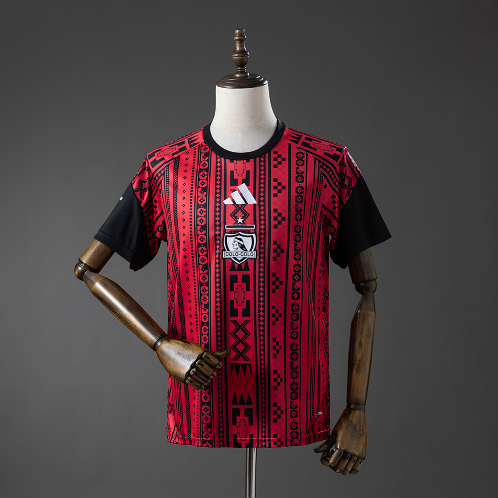 Mens Colo Colo Pre-Match Jersey 2026/27 Front view of the Mens Colo Colo Pre-Match Jersey 2026/27 in red and black with Mapuche textile patterns