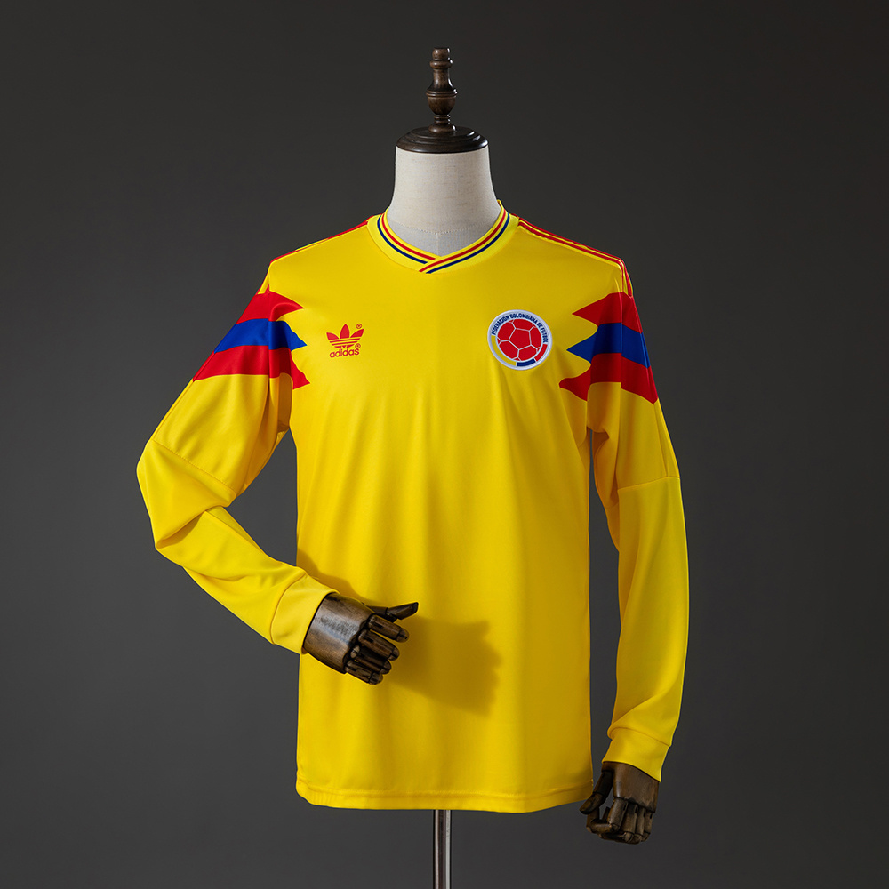 Mens Colombia Originals Retro Long Sleeve Home Jersey 1990 Mens Colombia Originals Retro Long Sleeve Home Jersey 1990 yellow shirt front view on mannequin