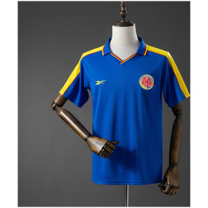 Front view of the Mens Colombia World Cup Retro Away Jersey 1998 in royal blue with yellow shoulder panels and polo collar