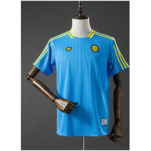 Blue Colombia T-shirt with yellow stripes and chest emblems front view