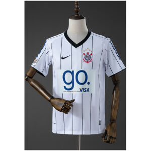 Mens Corinthians Pre/Season Retro Home Jersey 2009 Front view of the Mens Corinthians Pre/Season Retro Home Jersey 2009 in white with black pinstripes and go. VISA sponsor