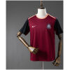 Front view of the Mens Corinthians Training Kit Jersey 2026/27 in burgundy with black sleeves and peach trim