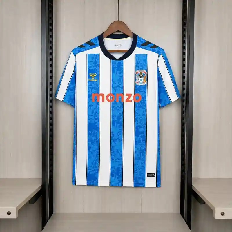 Mens Coventry City Home Jersey 2026/27 Coventry City home 2026/27 jersey on a hanger with vertical blue and white stripes