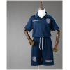 Kids Ecuador Away Kit 2026 front view showing midnight navy polo jersey and navy shorts on mannequin