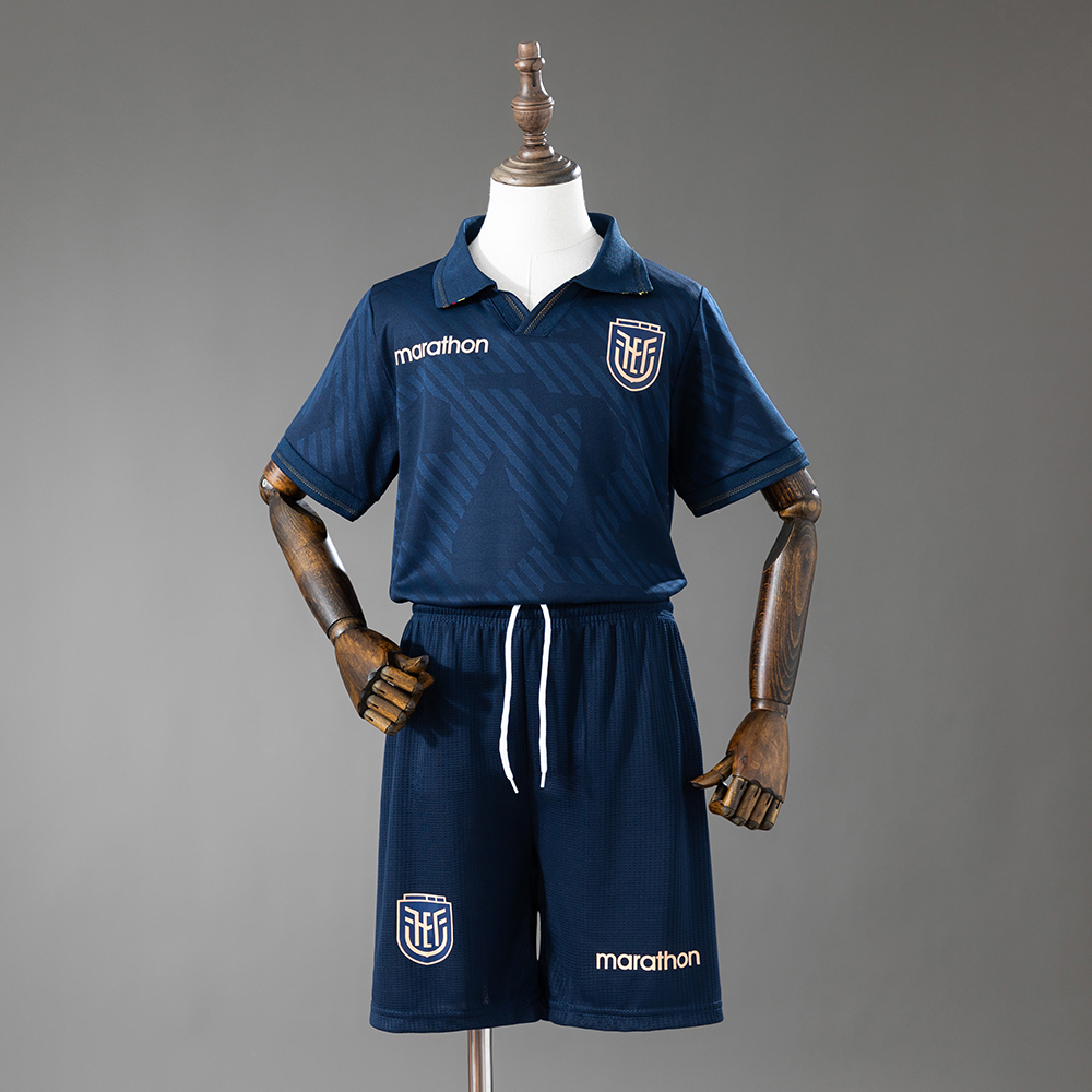 Kids Ecuador Away Kit 2026 Kids Ecuador Away Kit 2026 front view showing midnight navy polo jersey and navy shorts on mannequin