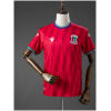 Front view of the Mens Equatorial Guinea Home Jersey 2025 in scarlet red with chevron textures and flag piping