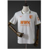 Mens FC Augsburg Fourth Jersey 2025/26 front view in cream white with terracotta crest and polo collar
