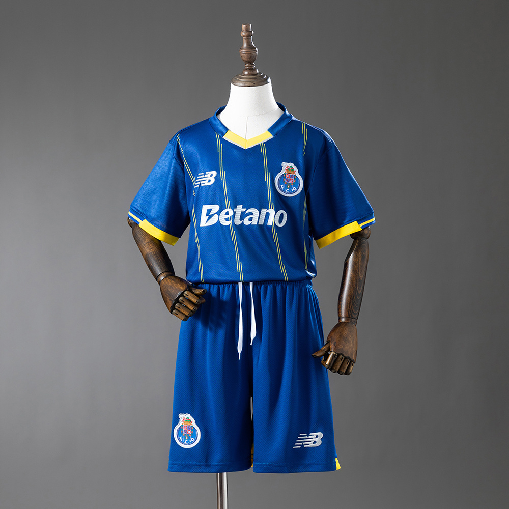 Kids FC Fourth Kit 2025/26 Kids FC Fourth Kit 2025/26 front view of blue shirt and shorts set