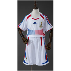 Kids France Retro Away Kit 2006 Kids France Retro Away Kit 2006 front view featuring white jersey with tricolor details and white shorts