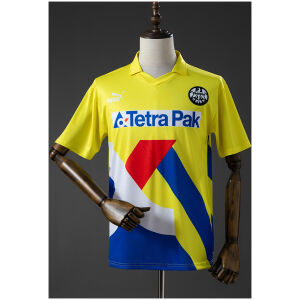 Front view of the Mens Frankfurt Retro Away Jersey 1993/96 in yellow with geometric color-blocking and Tetra Pak logo
