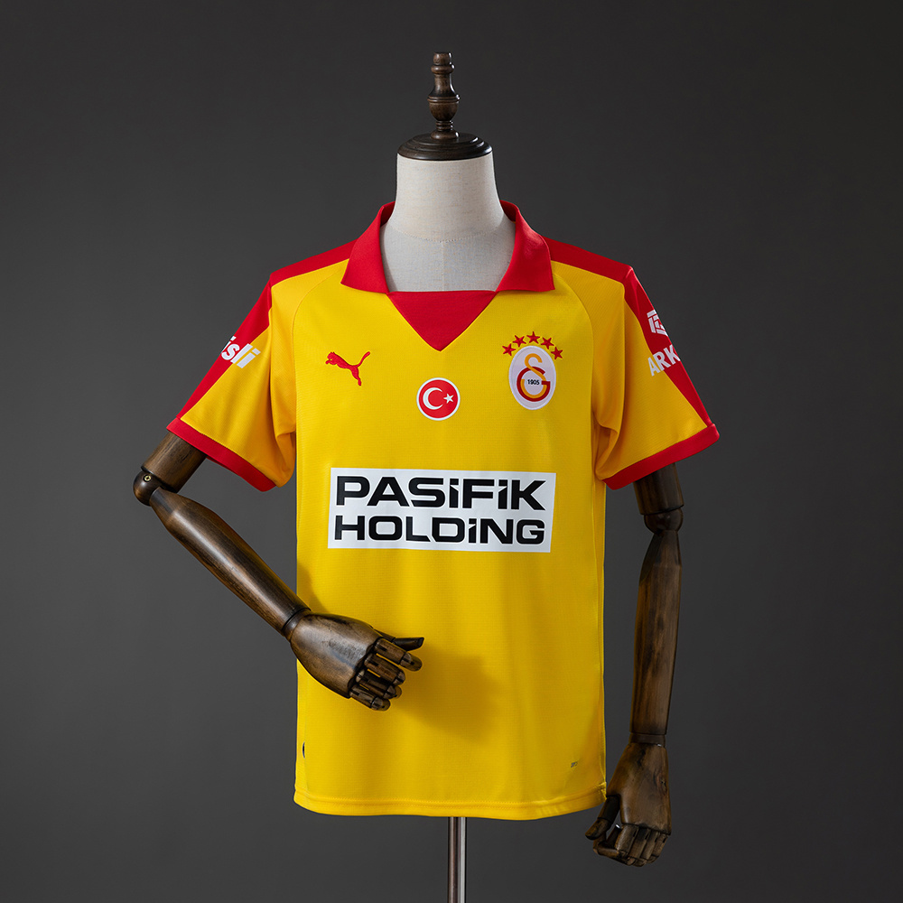 Mens Galatasaray Yellow Edition Retro Jersey 2025/26 Front view of the Mens Galatasaray Yellow Edition Retro Jersey 2025/26 in golden yellow with red sleeves and retro collar