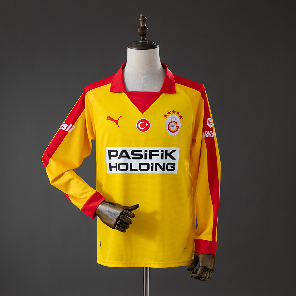 Mens Galatasaray Yellow Retro Long Sleeve Jersey 2025/26 Front view of the Mens Galatasaray Yellow Retro Long Sleeve Jersey 2025/26 in yellow with red polo collar