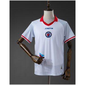 Mens Haiti Away Jersey 2026 front view in white with scarlet polo collar and centered FHF crest