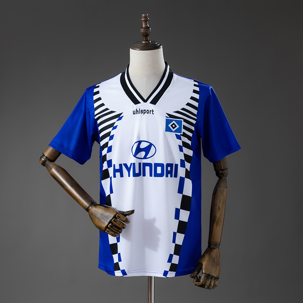 Mens Hamburg Retro Away Jersey 1996 Mens Hamburg Retro Away Jersey 1996 front view in white and blue with checkered graphics and HSV crest
