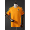 Orange Ivory Coast terrace T-shirt with green shoulder stripes front view