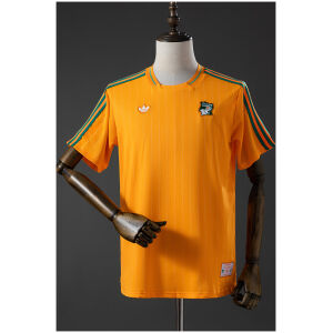 Orange Ivory Coast terrace T-shirt with green shoulder stripes front view