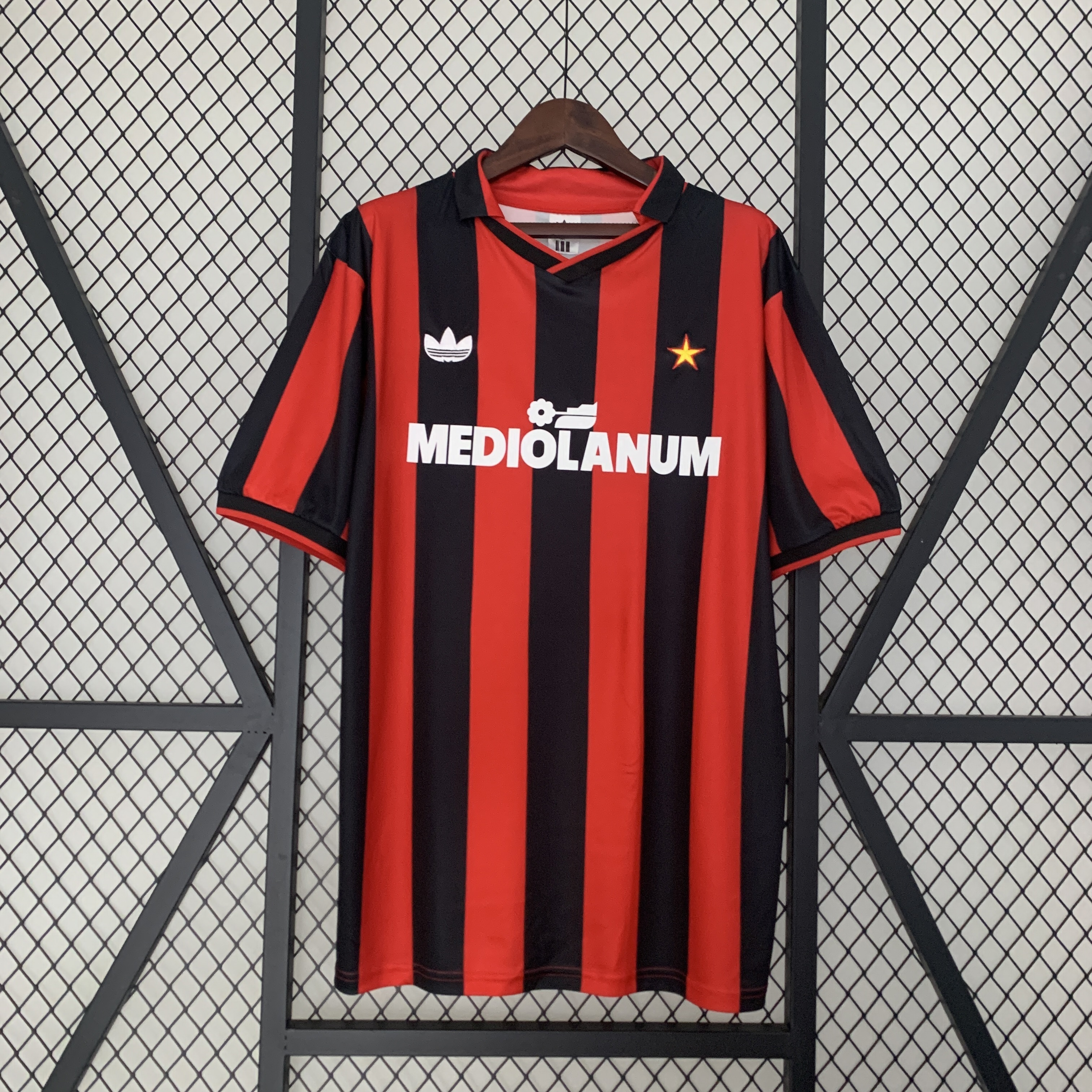 Mens AC Milan Retro Home Jersey 1990/91 Mens AC Milan Retro Home Jersey 1990/91 front view in red and black stripes featuring Mediolanum sponsor