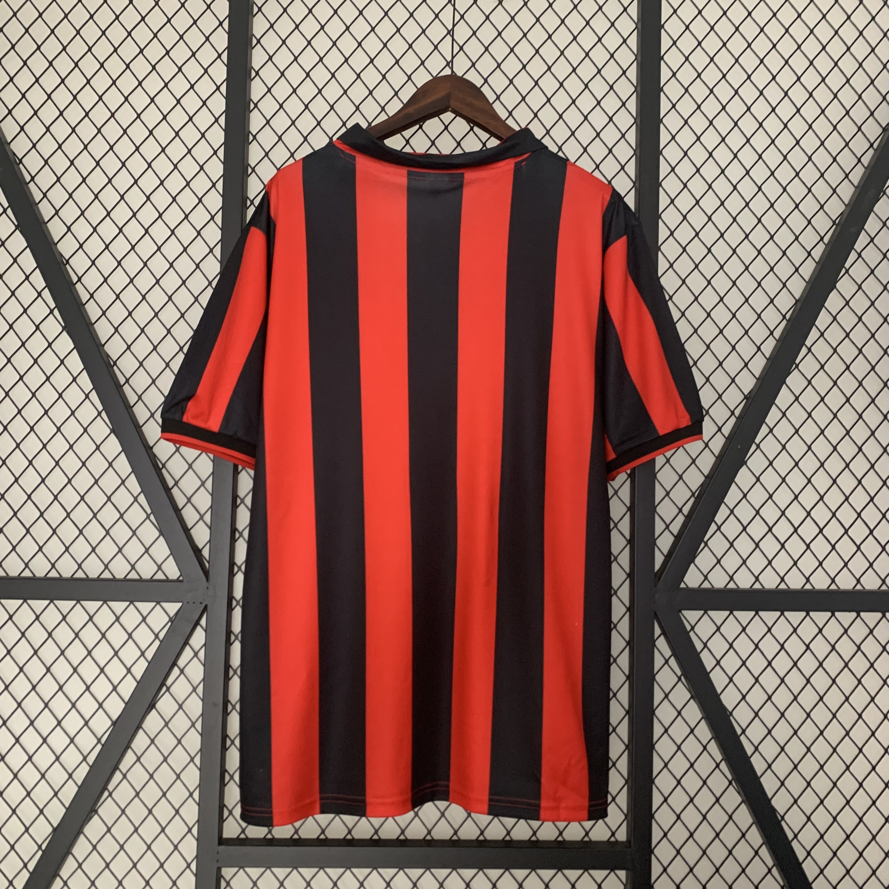 Mens AC Milan Retro Home Jersey 1990/91 Mens AC Milan Retro Home Jersey 1990/91 rear view showing classic Rossoneri vertical stripes and black collar