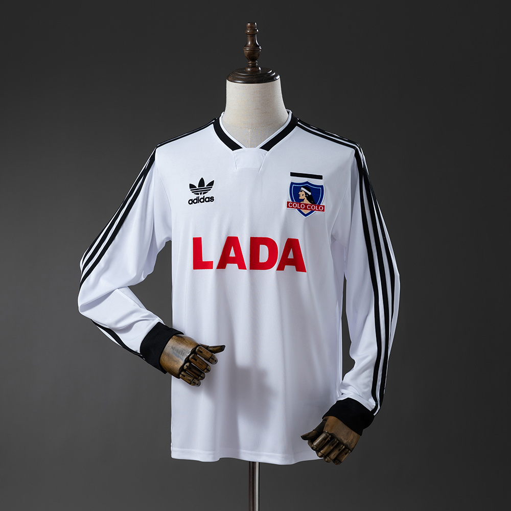 Mens Colo Colo Long Sleeve Home Jersey 1991/92 Mens Colo Colo Long Sleeve Home Jersey 1991/92 front view in white with red LADA sponsor and black stripes