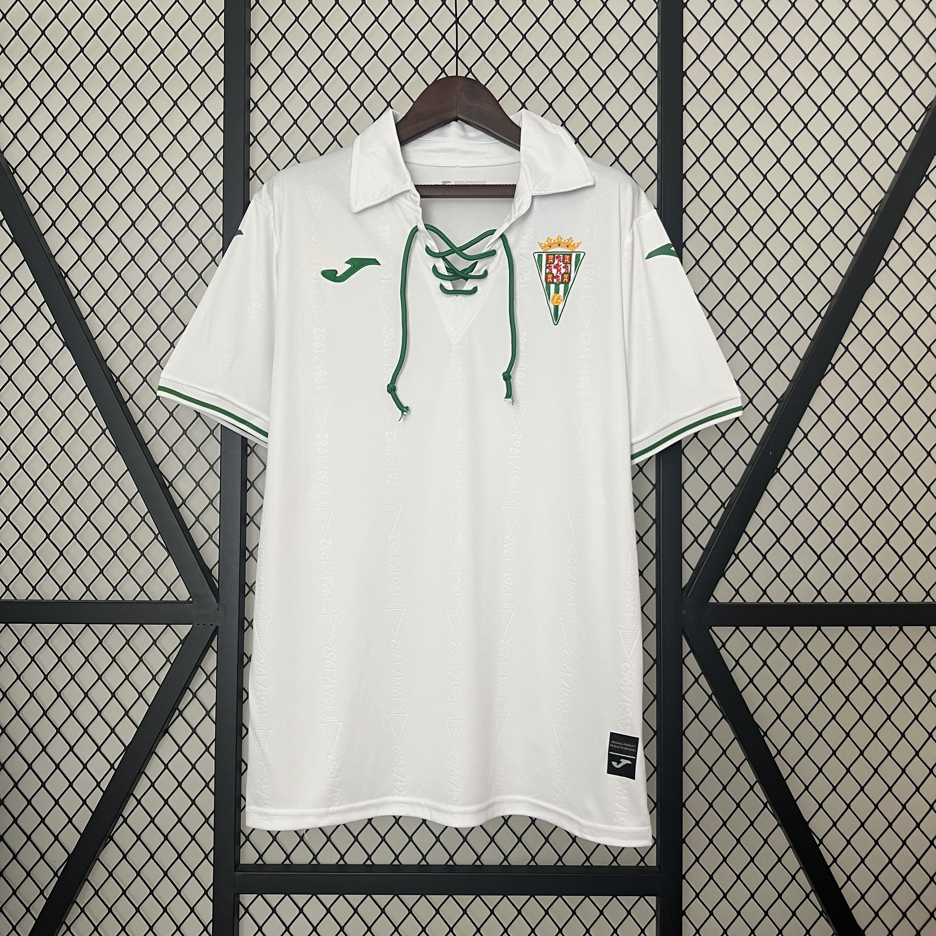 Mens Cordoba 70th Edition white Anniversary Jersey 2024/25 Mens Cordoba 70th Edition white Anniversary Jersey 2024/25 front view showing green lace-up collar and historic crest