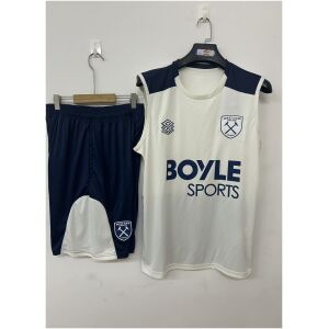 Mens West Ham United beige Training Kit Singlet Kits Kit 2025/26 flat lay showing beige sleeveless top and navy shorts