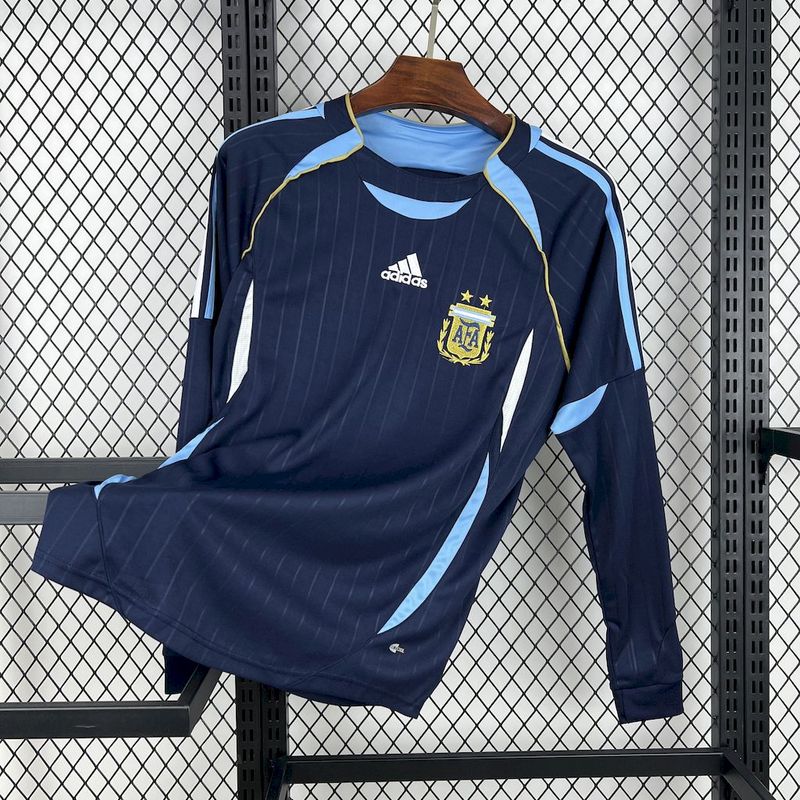 Mens World Cup Argentina Retro Long Sleeve Away Jersey 2006 Mens World Cup Argentina Retro Long Sleeve Away Jersey 2006 navy blue shirt front view with Teamgeist panels and two-star AFA crest