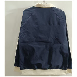 Mens Argentina Blue Windbreaker 2025 navy blue coach jacket rear view with cream collar, cream waistband, and raglan sleeves