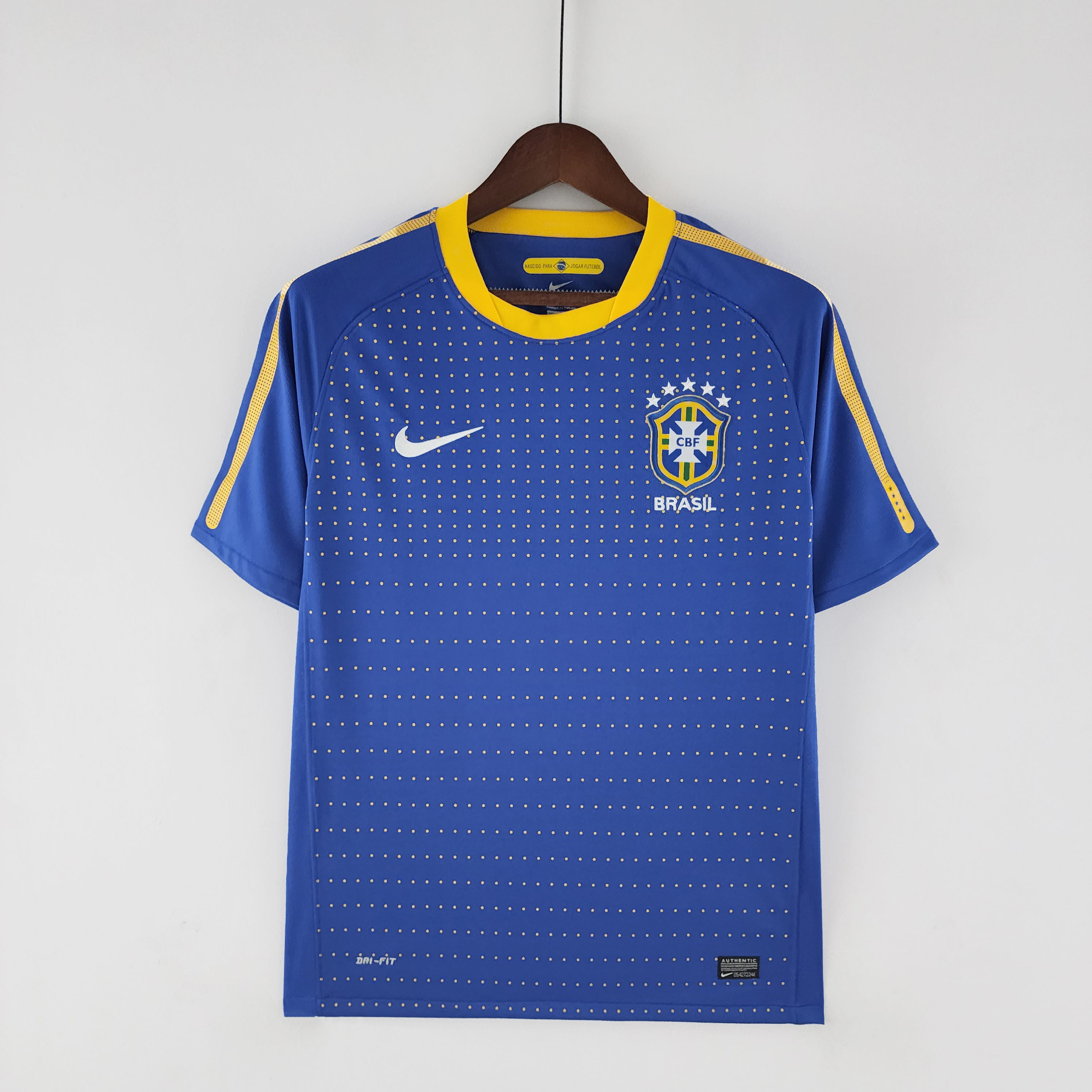 Mens World Cup Brazil blue Retro Away Jersey 2010 Mens World Cup Brazil blue Retro Away Jersey 2010 front view in blue with yellow dot matrix and CBF crest