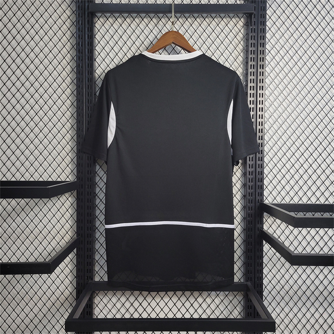 Mens World Cup Brazil Black Retro Goalkeeper Jersey 2002 Mens World Cup Brazil Black Retro Goalkeeper Jersey 2002 black shirt rear view on hanger with horizontal white piping