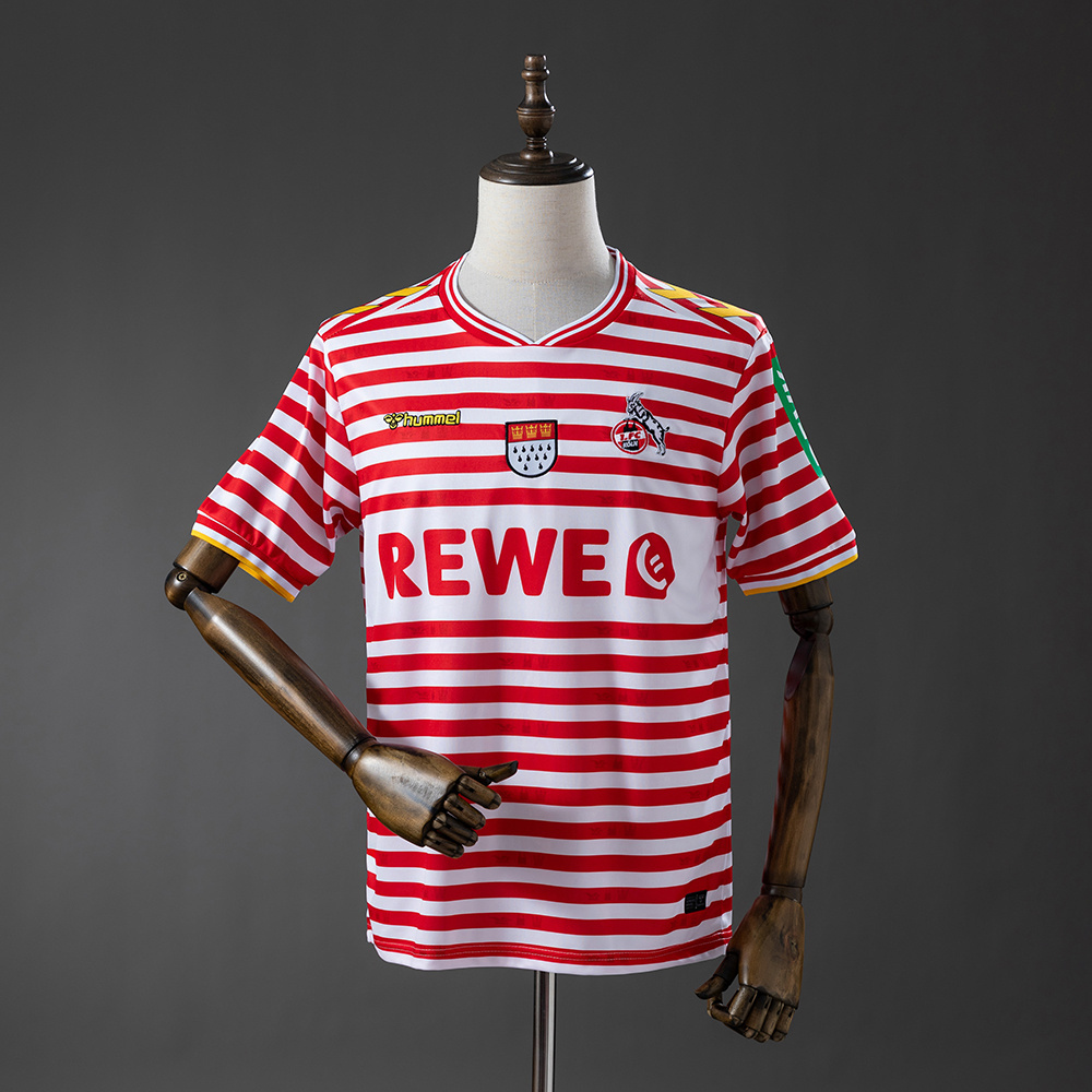 Mens Koln Carnival Jersey 2025/26 Mens Koln Carnival Jersey 2025/26 front view displaying red and white hoops and city coat of arms