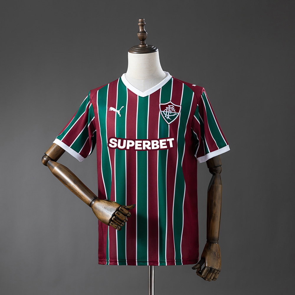 Mens Fluminense Home Jersey 2026/27 Front view of the Mens Fluminense Home Jersey 2026/27 in garnet and green vertical stripes with white V-neck