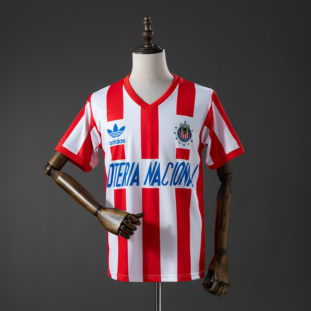 Mens Guadalajara Retro Home Jersey 1991/92 Mens Guadalajara Retro Home Jersey 1991/92 front view in red and white stripes with Lotería Nacional sponsor