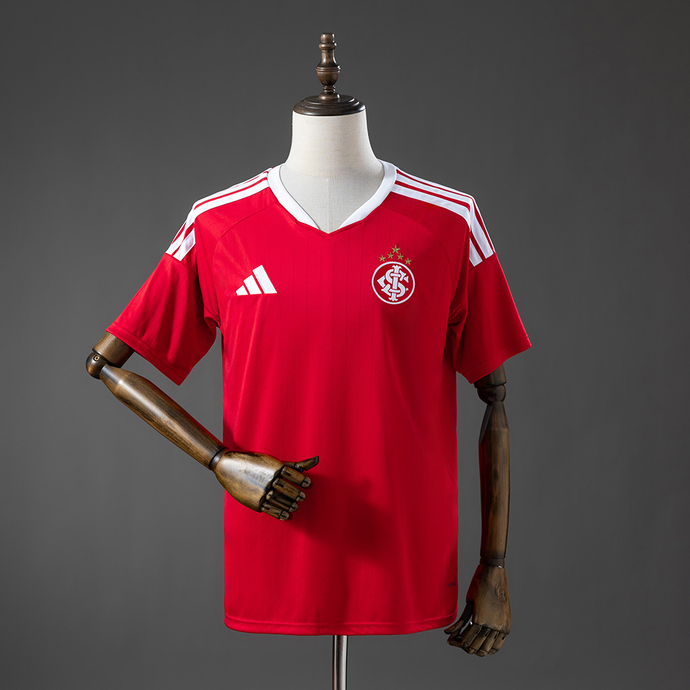 Mens Internacional Home Jersey 2026/27 Mens Internacional Home Jersey 2026/27 front view in scarlet red with white V-neck, SCI crest and adidas stripes