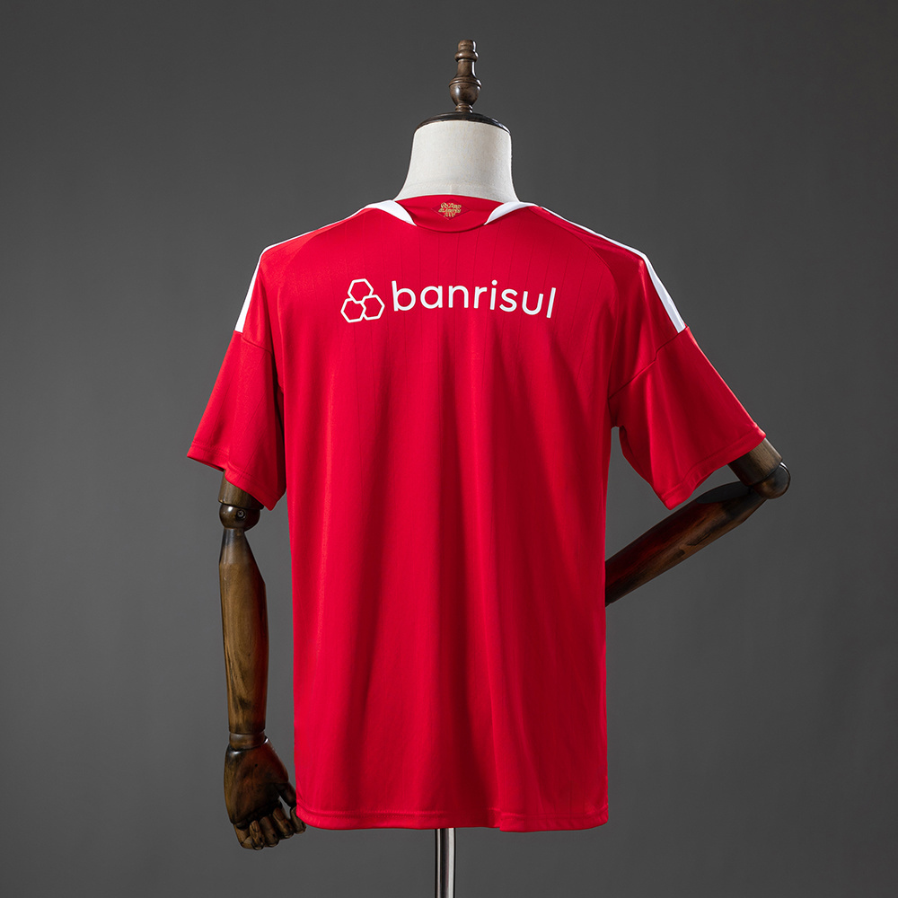 Mens Internacional Home Jersey 2026/27 Mens Internacional Home Jersey 2026/27 rear view in red showing white Banrisul back sponsor and collar trophy detail