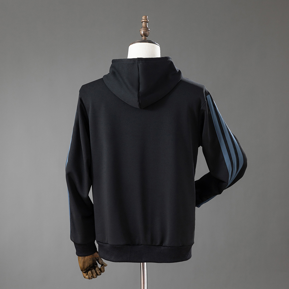 Mens Colo Colo Sweatshirt 2026/27 Mens Colo Colo Sweatshirt 2026/27 back view showing clean solid black pullover fleece with hood and slate sleeve stripes
