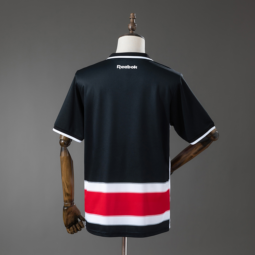 Mens Santa Cruz Home Jersey 2026/27 Mens Santa Cruz Home Jersey 2026/27 black back view with tricolor lower hem