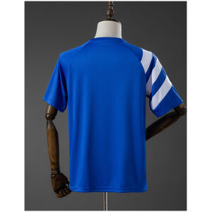Mens Schalke 04 Statement Jersey 2026/27 rear view showing solid blue back panel and asymmetric right sleeve stripes