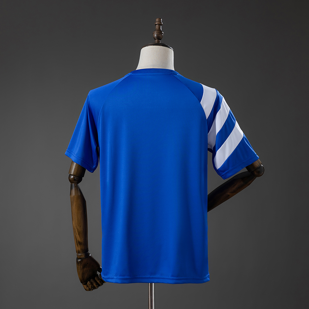 Mens Schalke 04 Statement Jersey 2026/27 Mens Schalke 04 Statement Jersey 2026/27 rear view showing solid blue back panel and asymmetric right sleeve stripes