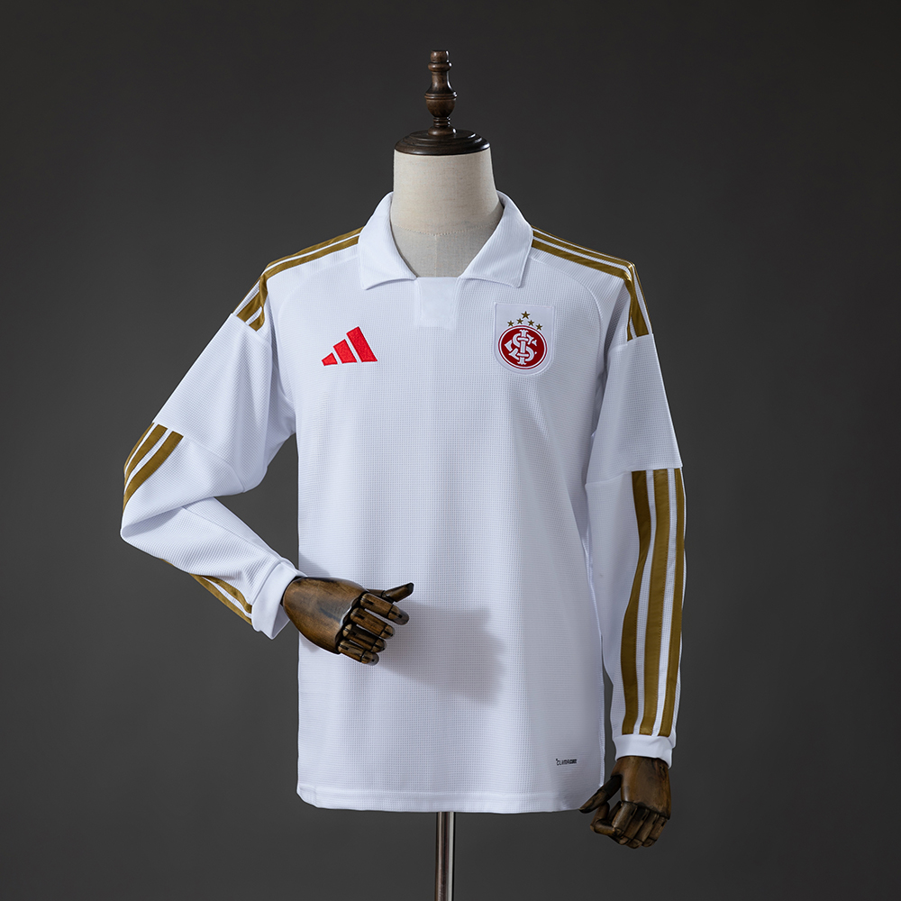 Mens Internacional Long Sleeve Away Jersey 2026/27 Mens Internacional Long Sleeve Away Jersey 2026/27 front view in white with gold stripes and red SCI crest