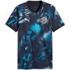 Front view of Mens Paraguay Away Jersey 2026 in dark navy with cyan smoke graphic and APF crest