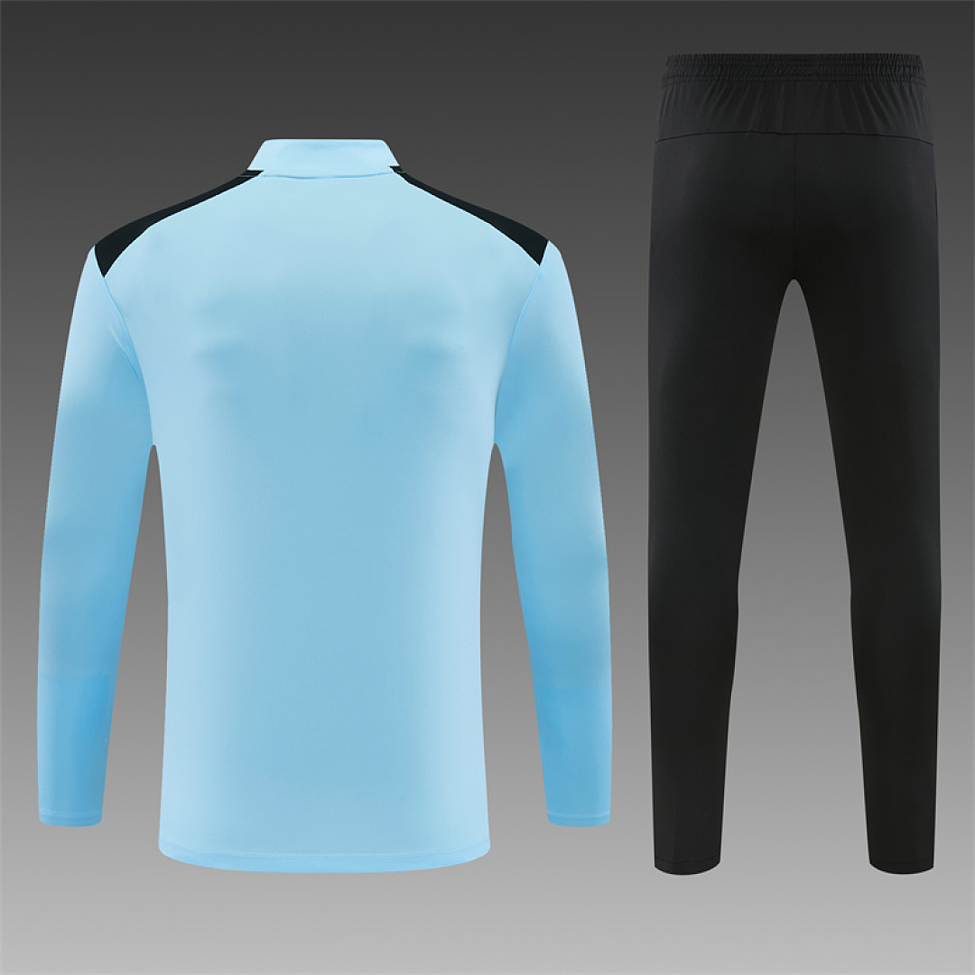 Mens Feyenoord Half-zip Light Blue Training Kit Suit 2026/27 Mens Feyenoord Half-zip Light Blue Training Kit Suit 2026/27 rear view of shirt and shorts