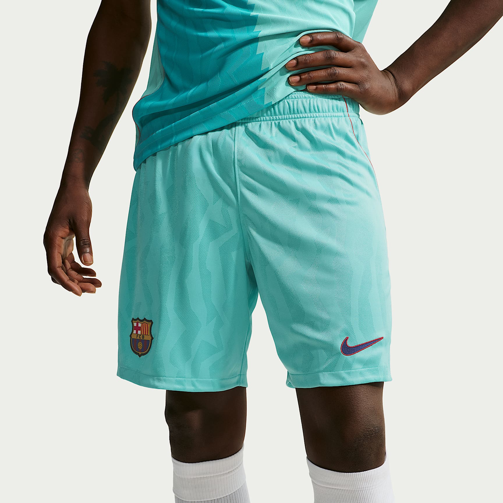 Mens Barcelona Third Shorts 2026/27 Mens Barcelona Third Shorts 2026/27 aqua green shorts front view with FC Barcelona crest and Nike Swoosh