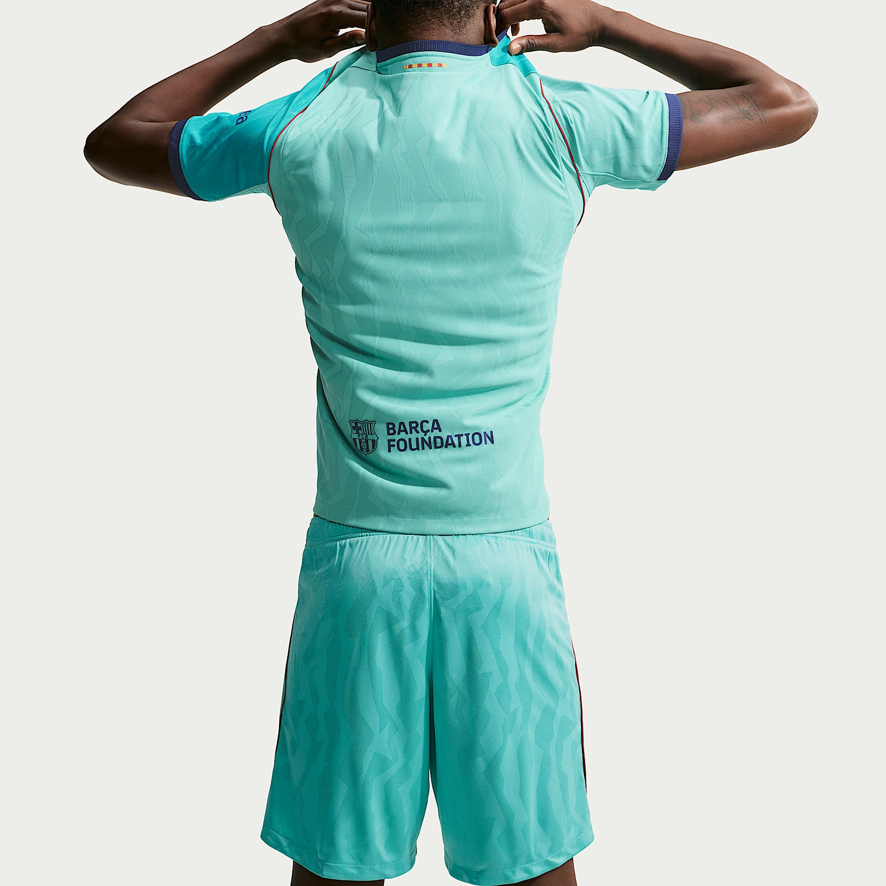 Mens Barcelona Third Shorts 2026/27 Mens Barcelona Third Shorts 2026/27 aqua green shorts rear view showing jacquard texture and side piping