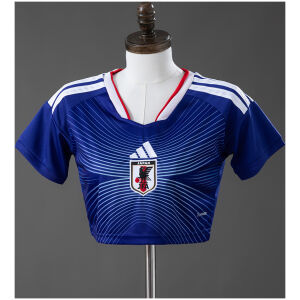 Womens Japan Style Home Crop Top 2026 front view in blue with radiating soundwaves and JFA crest