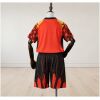 Kids Olympique Marseille Orange Goalkeeper Kit 2026/27 front view with graphic shorts