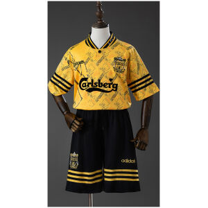 Kids Liverpool Retro Third Kit 1994/96 front view featuring yellow jersey and black shorts with Carlsberg sponsor