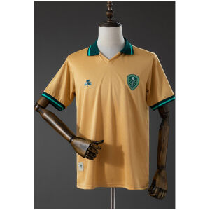 Mens Leeds United St. Patrick’s Day Jersey 2026/27 gold shirt front view on mannequin