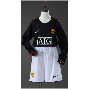 Kids Manchester United Retro Long Sleeve Away Kit 2007/08 front view with black long sleeve jersey, AIG sponsor, and white shorts