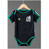Baby Mexico Third Jersey 2026 front view baby bodysuit in black with Aztec pattern and green trim
